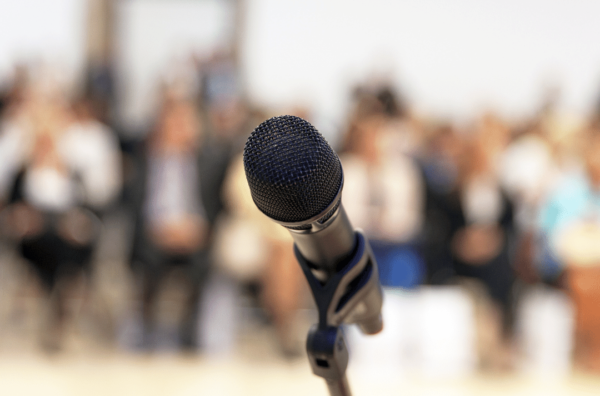 Microphone in front of a crowd